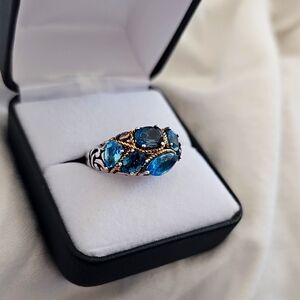 Vintage Blue and Silver Topaz Ring with Intricate Metalwork